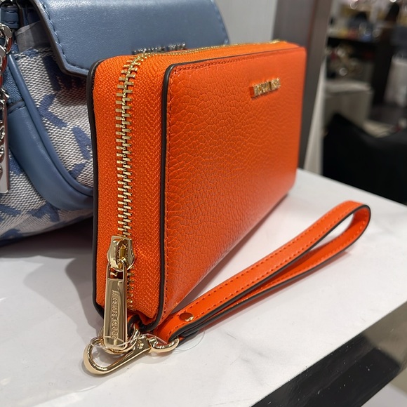 MICHAEL KORS JST
Leather Continental Wristlet Phone Case Wallet
Poppy
NWT - Picture 16 of 16